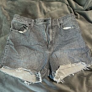 Vintage style black denim shorts, size 14. No stains or tears.